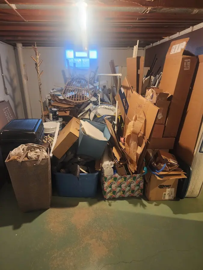 Roll-off dumpster container at job site for Roll Off Dumpster Rental in Dawson